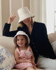 Kerry Pieri Wearing Custom Genevieve Rose Atelier White Bucket Hat