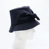 Natalie Suarez navy bucket hat by Genevieve Rose Atelier