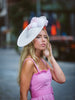 White Derby Spot Disc Hat with Pompoms by Genevieve Rose Atelier